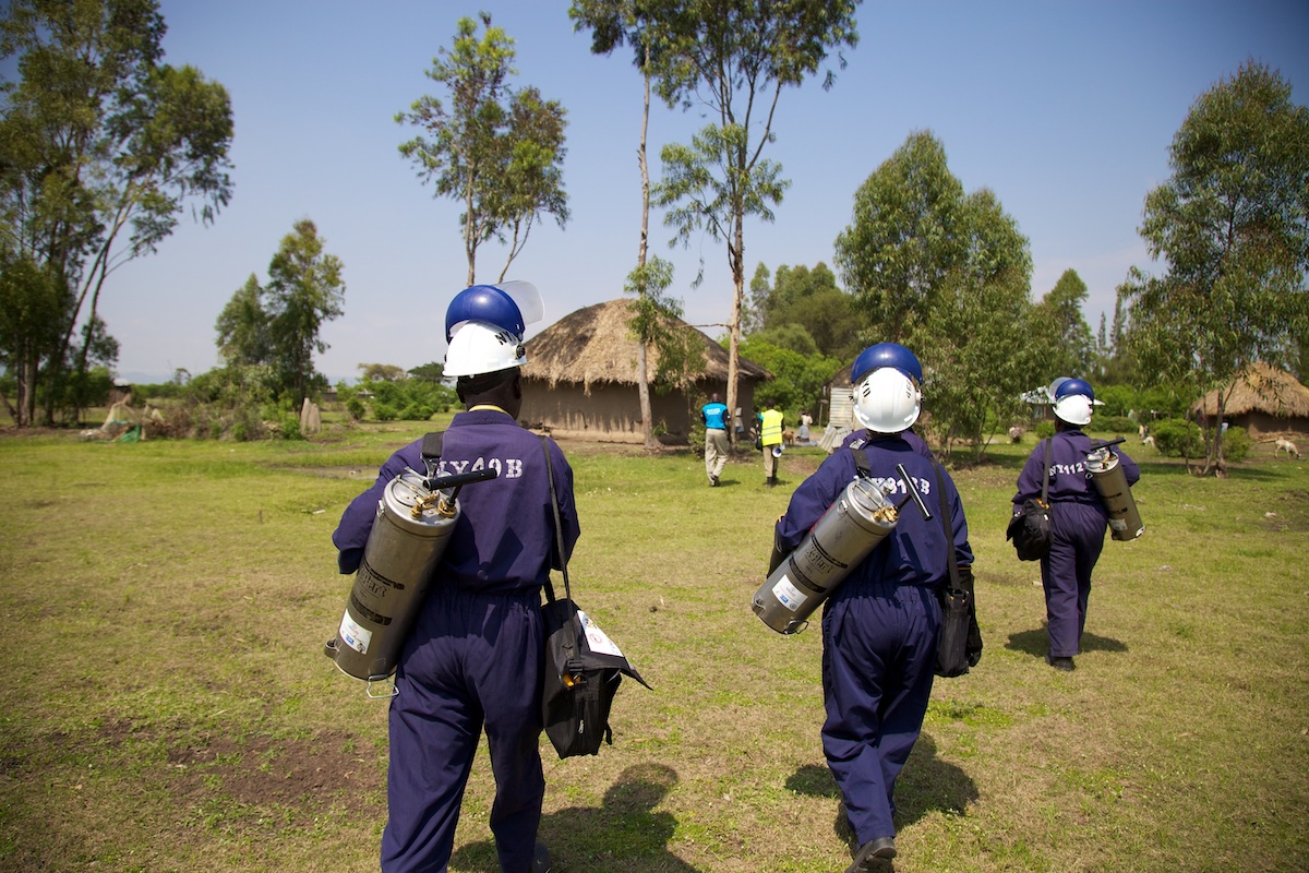 IRS operators head out for a day of work, IRS spray campaign, Kenya, 2014